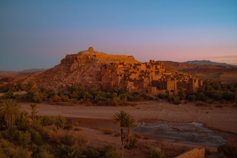 A desert landscape with a small village